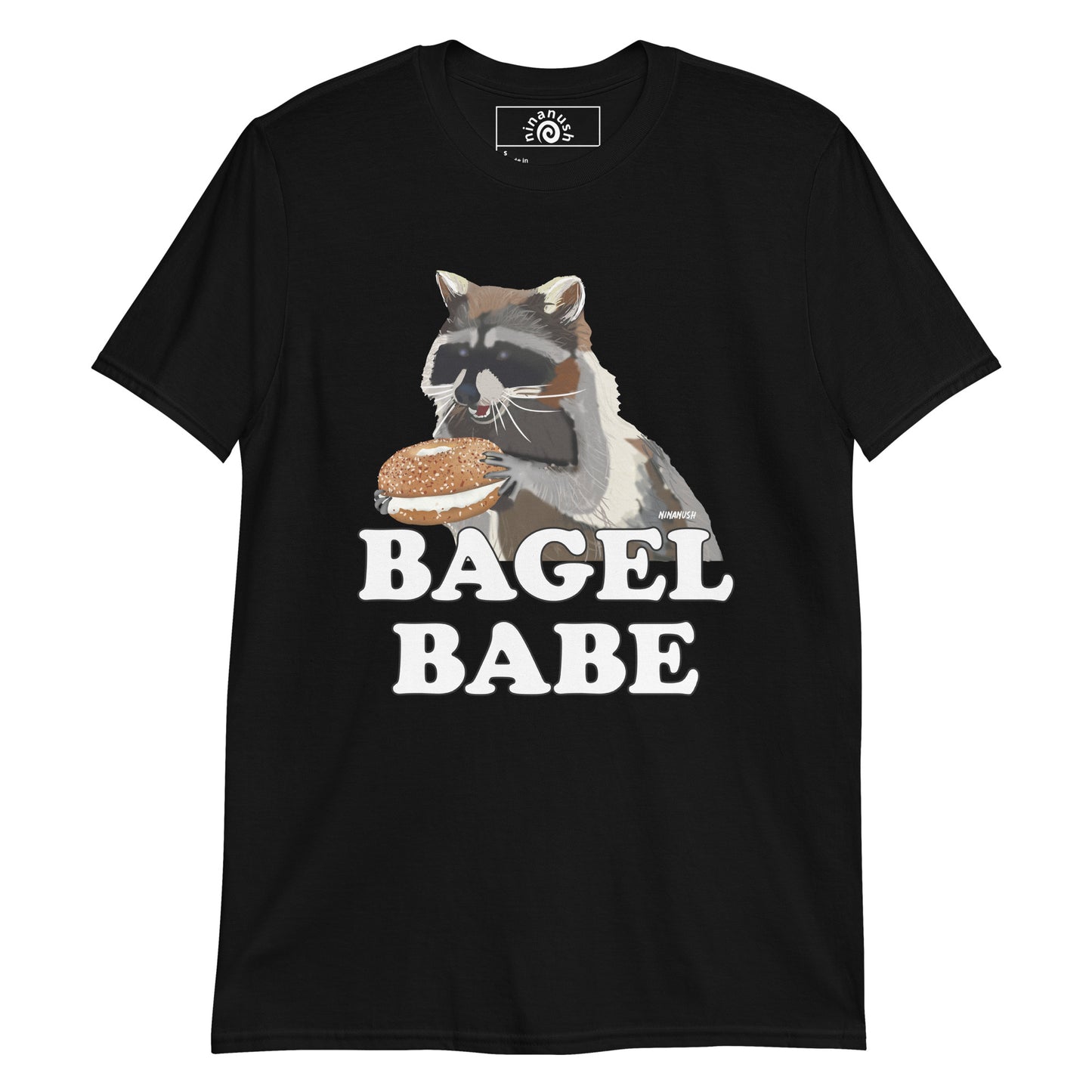 Black Raccoon Bagel Babe T-shirt from Nina's Funky Shop by ninanush - Do you love bagels? Looking for a funny gift for a bagel enthusiast? Our Bagel Babe Raccoon T-shirt is soft, comfortable and just what you need. It's a unisex bagel lover shirt with "bagel babe" and an original hand drawn raccoon eating a bagel. A funny t-shirt for foodies, bagel babes and raccoon lovers alike. 