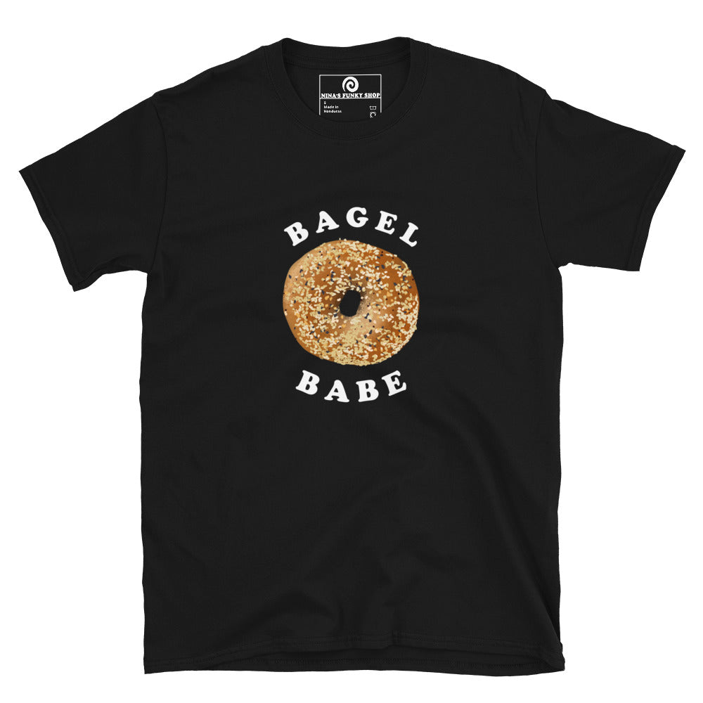 Black bagel babe t-shirt - Love bagels? Looking for a gift for a bagel enthusiast? This t-shirt is soft, comfortable and comes in a variety of colors with an everything bagel design, expertly printed on the front. Eat your favorite bagels in style or give this funny food t-shirt as a gift for a bagel lover.  The perfect graphic tee for foodies and beyond.