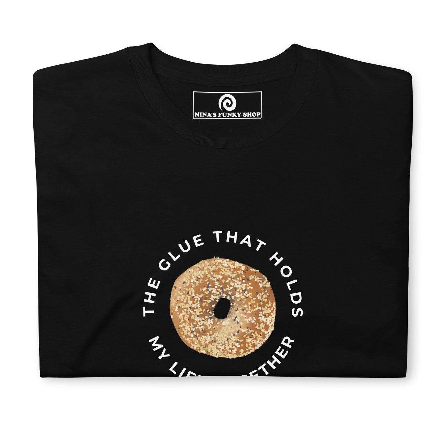 Black Everything Bagel T-Shirt - Our Bagels Are The Glue That Holds My Life Together T-Shirt is soft, comfortable and just what you need! It's a classic cotton tee with a funny everything bagel design, expertly printed on the front. The perfect shirt for bagel lovers and foodies of all kinds. Unique foodie apparel designed by Nina and made just for you.