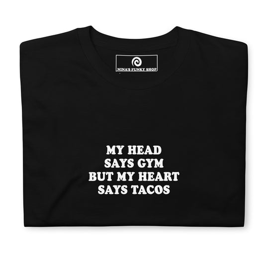 Black Taco T-Shirt - My head says gym but my heart says tacos! This taco t-shirt is soft and comfortable. It's a classic cotton shirt with a funny taco saying, expertly printed on the front. The perfect tee for taco lovers and foodies of all kinds. Looking for something personalized? Shoot us an email!