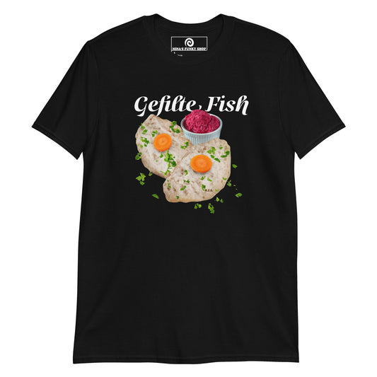 Black Gefilte Fish T-Shirt - Our Gefilte Fish T-Shirt is soft, comfortable, and made just for you. It's a classic cotton graphic tee with gefilte fish, expertly printed on the front. A funny food t-shirt for Jews, foodies and Gefilte fish lovers and haters alike.
