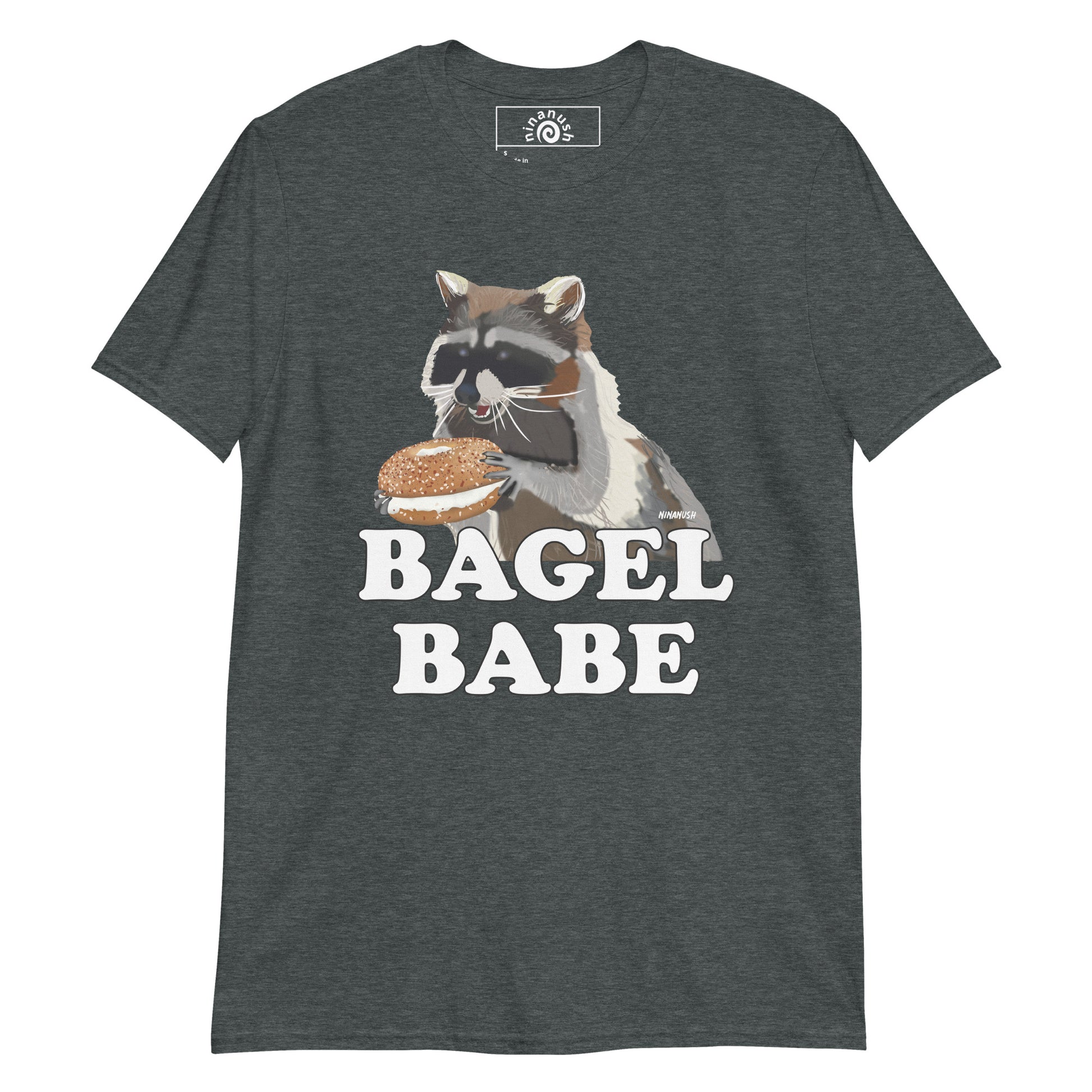 Dark Gray Raccoon Bagel Babe T-shirt from Nina's Funky Shop by ninanush - Do you love bagels? Looking for a funny gift for a bagel enthusiast? Our Bagel Babe Raccoon T-shirt is soft, comfortable and just what you need. It's a unisex bagel lover shirt with "bagel babe" and an original hand drawn raccoon eating a bagel. A funny t-shirt for foodies, bagel babes and raccoon lovers alike.