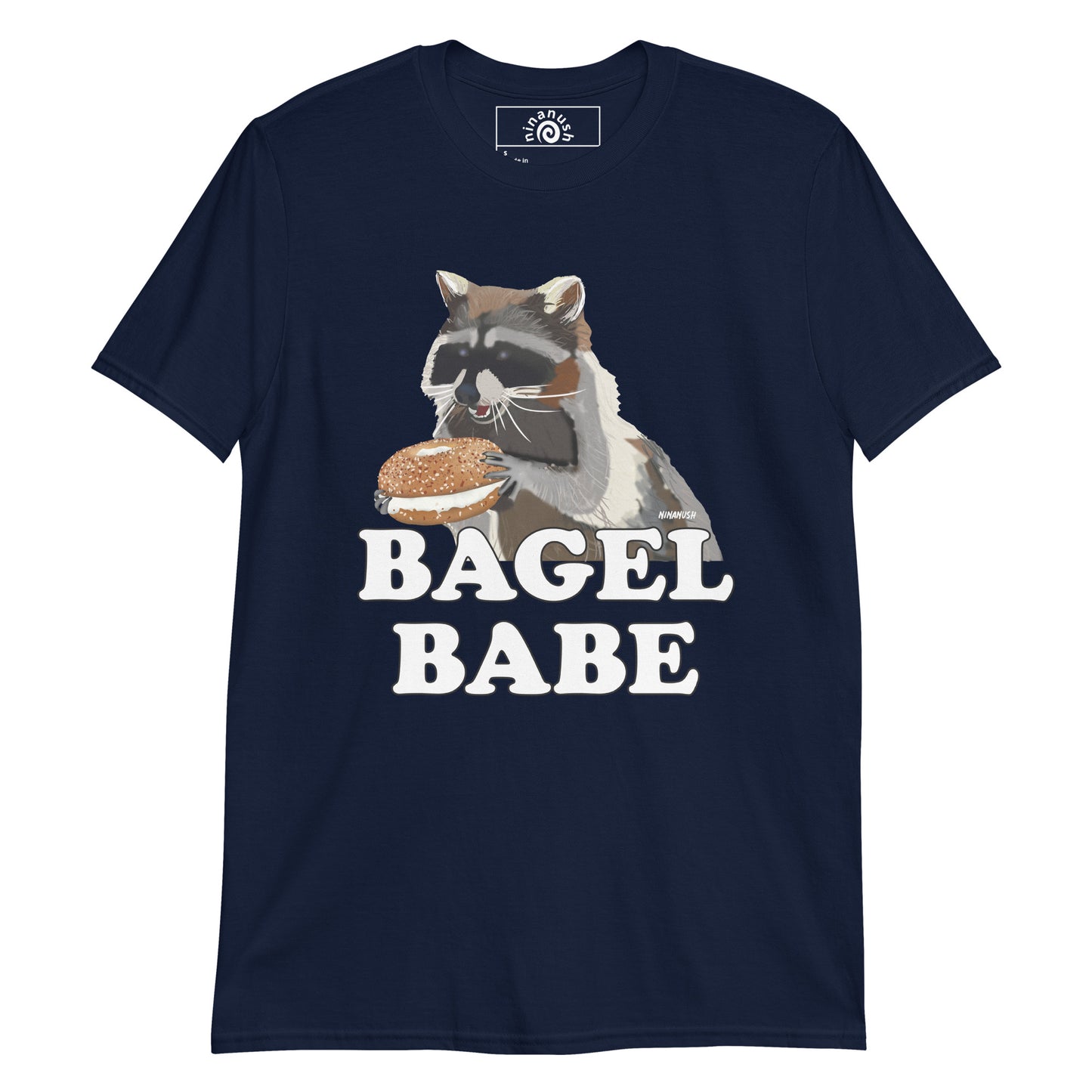 Navy Raccoon Bagel Babe T-shirt from Nina's Funky Shop by ninanush - Do you love bagels? Looking for a funny gift for a bagel enthusiast? Our Bagel Babe Raccoon T-shirt is soft, comfortable and just what you need. It's a unisex bagel lover shirt with "bagel babe" and an original hand drawn raccoon eating a bagel. A funny t-shirt for foodies, bagel babes and raccoon lovers alike.