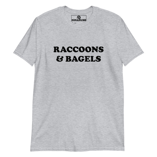 Gray raccoons and bagels t-shirt from Nina's Funky Shop by ninanush - The raccoons and bagels t-shirt! This classic cotton tee was designed for raccoon and bagel lovers and foodies of all kinds. Share your passion for raccoons and bagels with the world or give this quirky t-shirt to your favorite raccoon lover. It's soft, comfortable and made just for you.