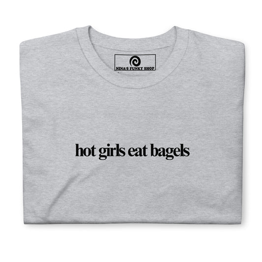 Gray Hot Girls Eat Bagels T-Shirt - Love bagels? Looking for a gift for a bagel enthusiast? Our Hot Girls Eat Bagels T-Shirt is just what you need. It's a classic cotton shirt with a funny bagel saying, expertly printed on the front. A perfect shirt for bagel lovers and foodies of all kinds. Looking for something personalized? Shoot us an email! 