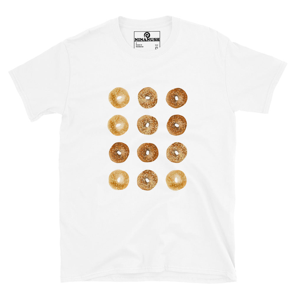 A unique bagel t-shirt with a dozen bagels—a must-have shirt for bagel lovers and foodies. Make a funny statement and eat bagels with this artsy and unique, bagel streetwear shirt. Perfect for enjoying bagel sandwiches or expressing your love for bagels. This shirt says "I love bagels and I don't care who knows it." 