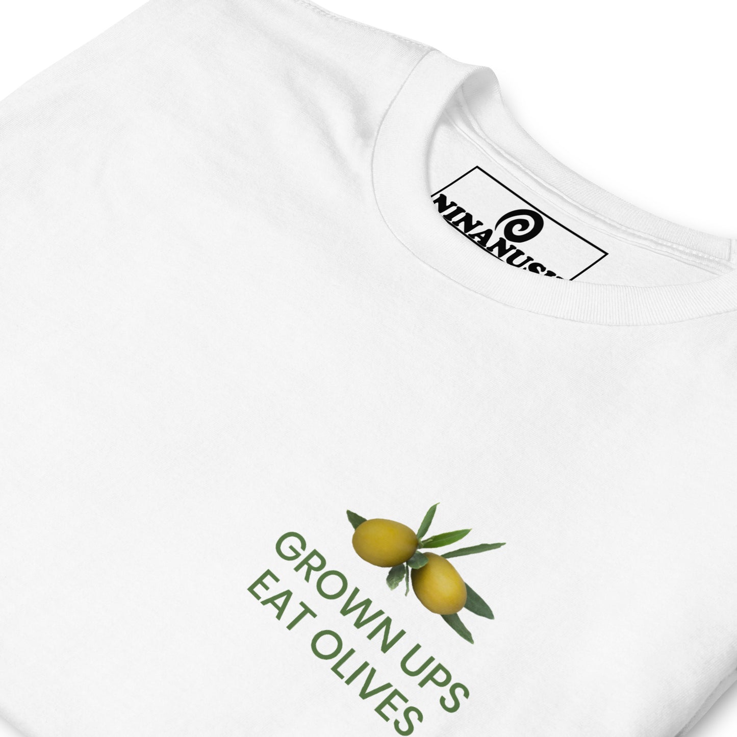 White grown ups eat olives t-shirt from Nina's Funky Shop by ninanush - A quirky cotton tee with a green olive design and a funny saying about olives. It's the perfect funny t-shirt for olive lovers and foodies of all kinds or a sarcastic t-shirt for olive haters. Make a bold statement with this funny food t-shirt or give it as a weird and unique gift to your favorite olive enthusiast.