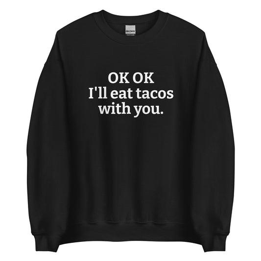 Black OK OK I'll eat tacos with you Sweatshirt from Nina's Funky Shop by ninanush - Do you love tacos? Looking for a funny gift for a friend? Our taco lover crewneck sweatshirt is  just what you need. It's a unisex taco sweatshirt with "OK OK I'll eat tacos with you." on the front. A funny taco sweatshirt for cozy nights in and quirky streetwear. This taco enthusiast sweatshirt is made just for you. 