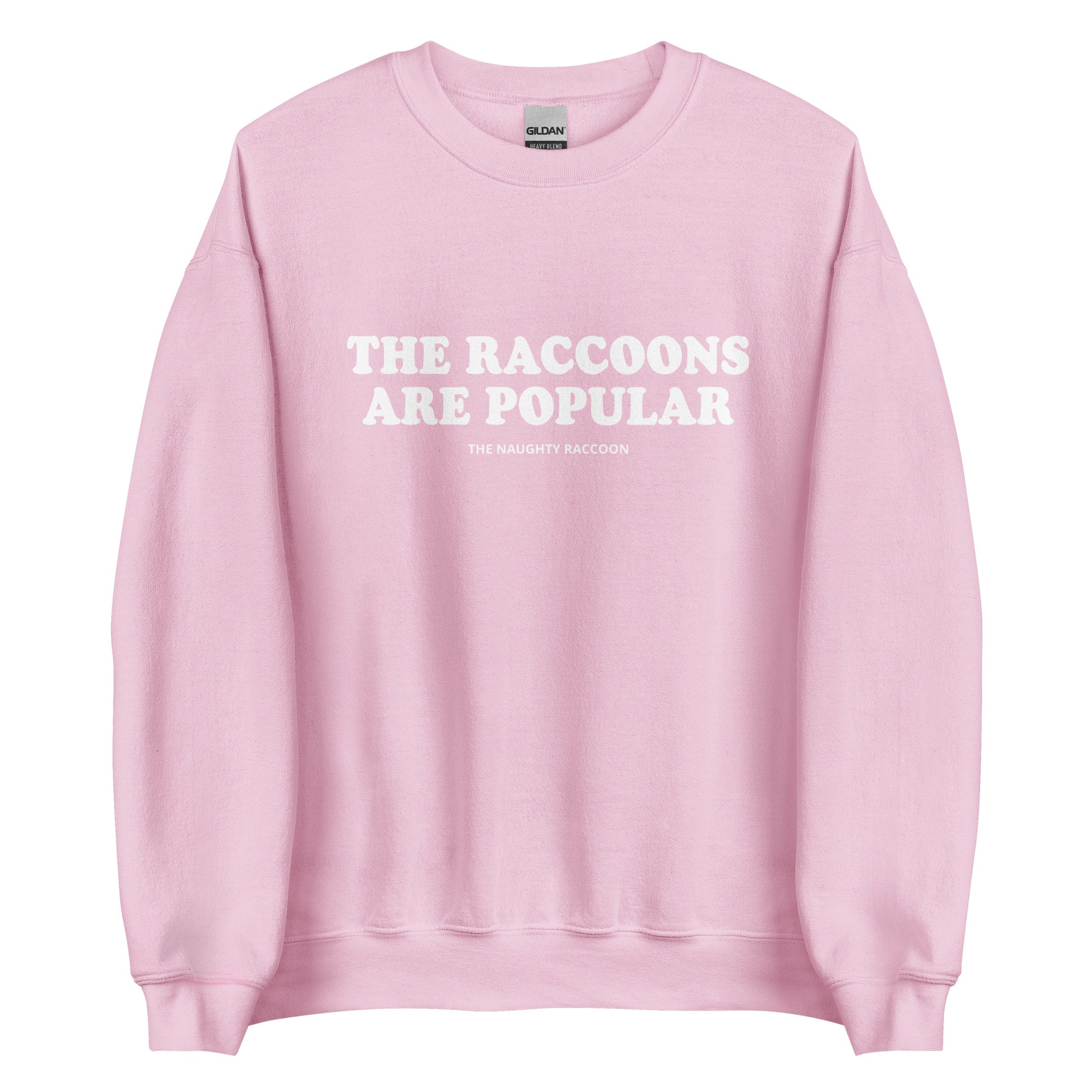 Light Pink The Raccoons Are Popular Sweatshirt from Nina's Funky Shop by ninanush - The Naughty Raccoon Sweatshirt - Do you love raccoons? Looking for a unique funny gift for a friend? Our The Raccoons Are Popular Crewneck Sweatshirt is soft and comfortable with a funny raccoon saying. It's a funny raccoon sweatshirt with a unique weird saying. The perfect weird sweatshirt for raccoon lovers and quirky tee enthusiasts alike.