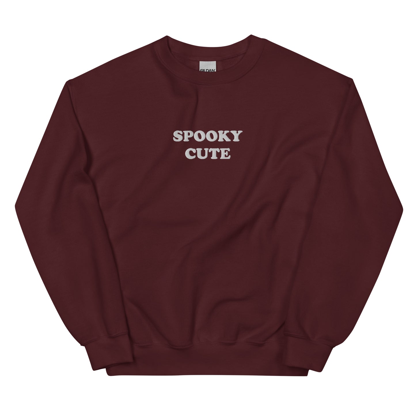 Maroon Spooky Cute Sweatshirt from Nina's Funky Shop by ninanush - Embrace your spooky in this unique spooky sweatshirt. It's a unisex sweatshirt with "Spooky Cute", embroidered on the front. Whether you're celebrating spooky season or embracing the spooky year-round, this sweatshirt is just what you need. A colorful sweatshirt for everyday style and a cute gift for spooky season.