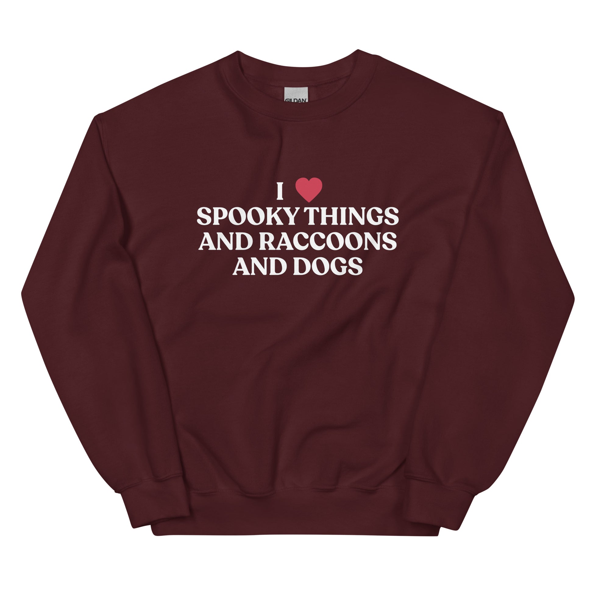 Maroon Halloween Sweatshirt - Our I Heart Spooky Things Raccoons and Dogs Sweatshirt is super soft and cozy. It comes in a variety of colors with a funny spooky season saying, expertly printed on the front. Make a statement in this funny Halloween crewneck sweatshirt.