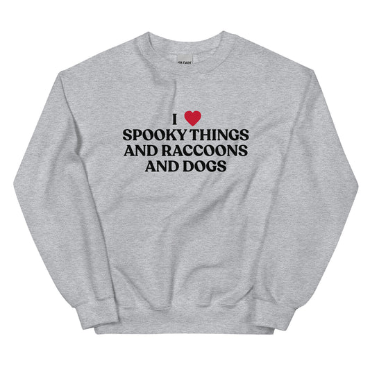 Gray Halloween Sweatshirt - Our I Heart Spooky Things Raccoons and Dogs Sweatshirt is super soft and cozy. It comes in a variety of colors with a funny spooky season saying, expertly printed on the front. Make a statement in this funny Halloween crewneck sweatshirt.