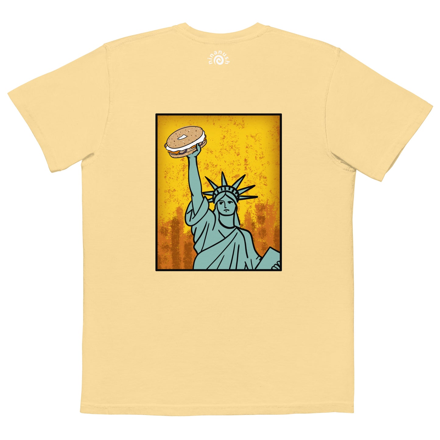 Yellow graphic t-shirt with new york everything bagel - Show your love of bagels with our funny food t-shirt designed for bagel enthusiasts. Available in various colors, this classic t-shirt has an original design of the Statue of Liberty holding a bagel, and a small everything bagel on the front. Let your love for bagels shine or give it as a unique gift for a bagel lover. 