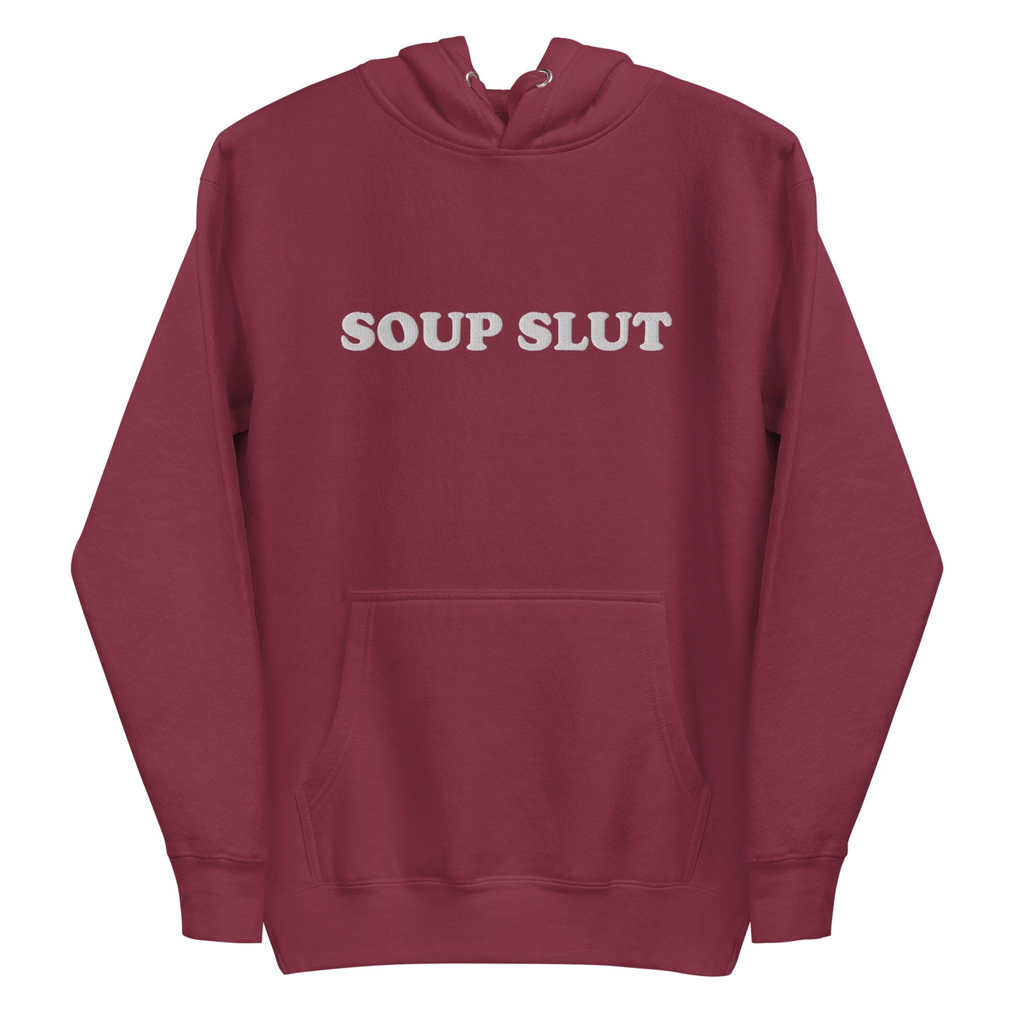 Maroon Soup Slut Hoodie - It's always soup season! This Soup Slut Hoodie is soft, comfortable and just what you need. It's a unisex hoodie that comes in a variety of colors with "Soup Slut", expertly embroidered on the front. It's the perfect hoodie for soup season, designed by Nina and made just for you. Celebrate your favorite foods in our funky foodie clothing and accessories!