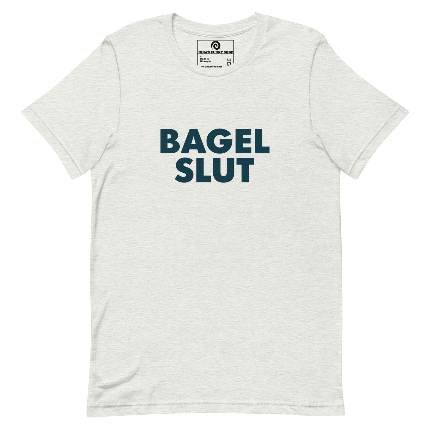 Light Gray Bagel Slut T-Shirt - Our Bagel Slut T-shirt is soft, comfortable and just what you need. It's a unisex t-shirt that comes in a variety of colors with a funny foodie design, expertly printed on the front. Stand out in our sarcastic t-shirts and celebrate your favorite foods in our funky foodie apparel. Designed by Nina and made just for you! Looking for something personalized? Shoot us an email!