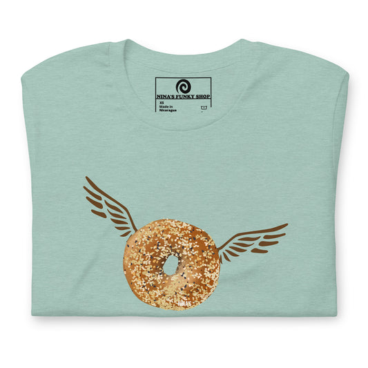 Green Angel Bagel T-Shirt - Do you love everything bagels? Looking for a gift for your favorite bagel enthusiast? This Angel Bagel T-shirt is just what you need! It's a soft and comfortable with a funky hand drawn bagel design, expertly printed on the front. Celebrate your favorite foods in our funky foodie clothing, designed by Nina and made just for you.