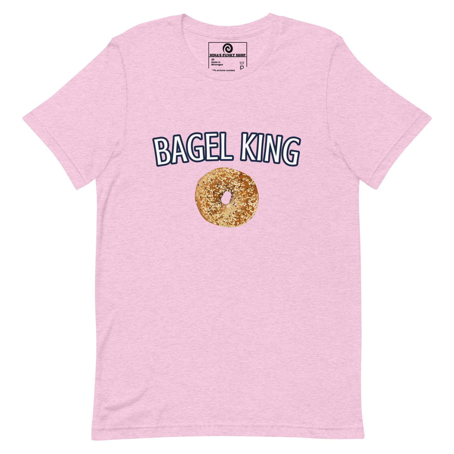 Bagel King Pink Everything Bagel T-shirt - Calling all bagel kings and queens! Looking for your new favorite shirt? A Gift for a fellow bagel enthusiast? This bagel t-shirt comes in a variety of colors with "bagel king" and a hand drawn everything bagel design, on the front. The perfect graphic tee for bagel lovers and foodies of all kinds.