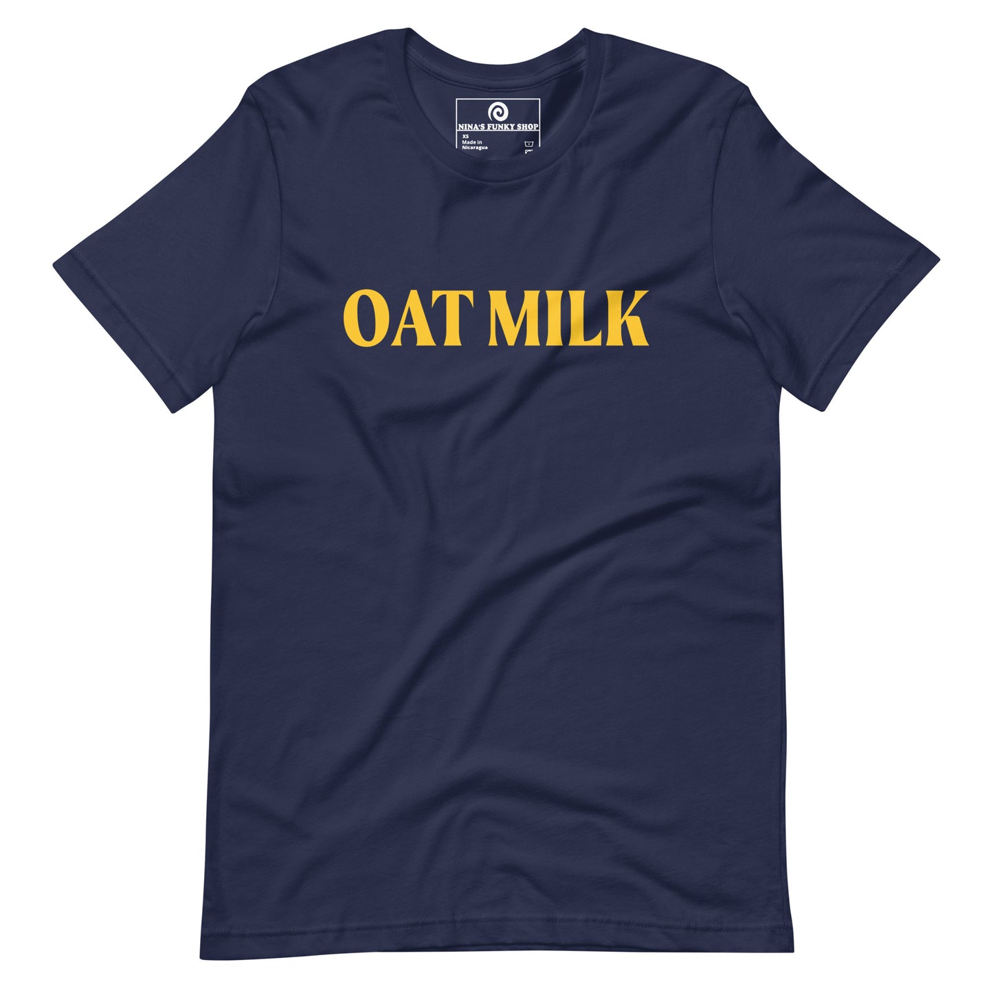 Navy Oat Milk T-shirt - Are you an oat milk enthusiast? Looking for a funny gift for a dairy free friend? Our Oat Milk T-shirt is soft, comfortable and just what you need. It's a unisex t-shirt that comes in a variety of colors with "oat milk", on the front. A funny t-shirt for plant based babes and foodies of all kinds. Celebrate your favorite foods in our funky foodie apparel. Designed by Nina and made just for you!