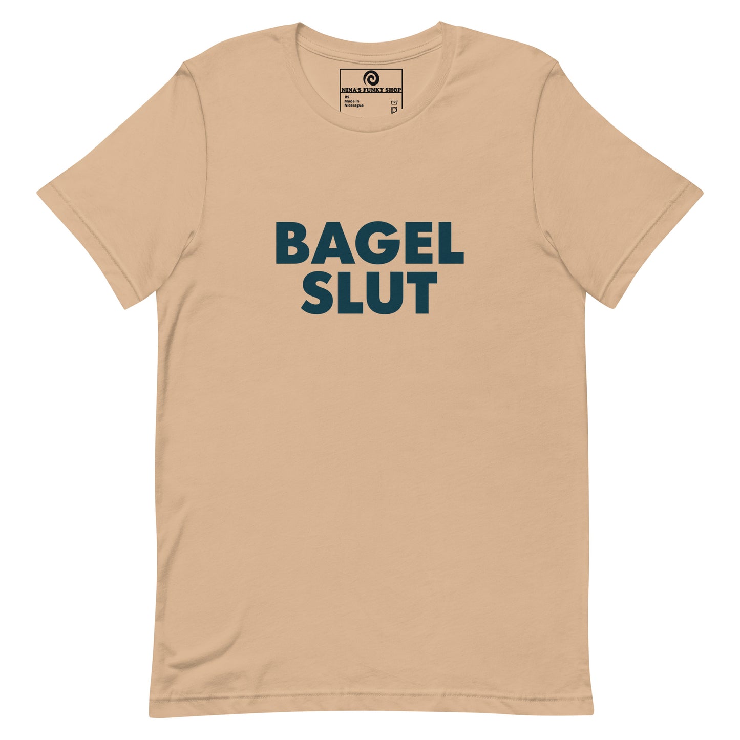 Tan Bagel Slut T-Shirt - Our Bagel Slut T-shirt is soft, comfortable and just what you need. It's a unisex t-shirt that comes in a variety of colors with a funny foodie design, expertly printed on the front. Stand out in our sarcastic t-shirts and celebrate your favorite foods in our funky foodie apparel. Designed by Nina and made just for you! Looking for something personalized? Shoot us an email!