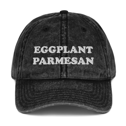 Black washed out dad hat for eggplant parmesan lovers - An eggplant parmesan hat for foodies and Italian food enthusiasts. Celebrate eggplant parm in this funny embroidered dad hat. It's a unique foodie hat that's made just for you. Share your love for eggplant parmesan in this random statement dad hat or give it as a funny gift for foodie or eggplant lovers of all kinds.