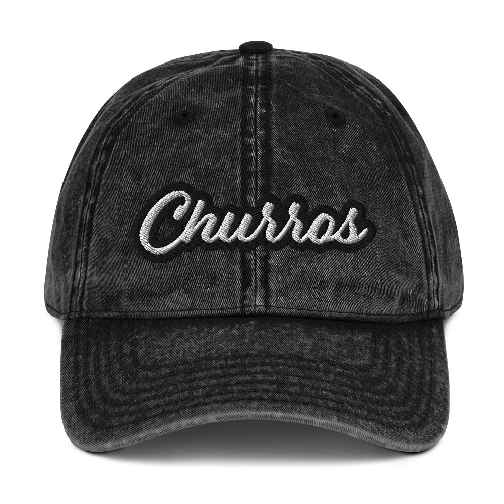 Faded black churros hat - This embroidered foodie dad hat is designed for churro lovers and foodies of all kinds. It's a comfortable, funny dad hat with a washed out, vintage style. This churro hat is perfect for everyday street style or a funny gift for a churro enthusiast. Stand out and celebrate your favorite foods in our funny foodie clothing and accessories.