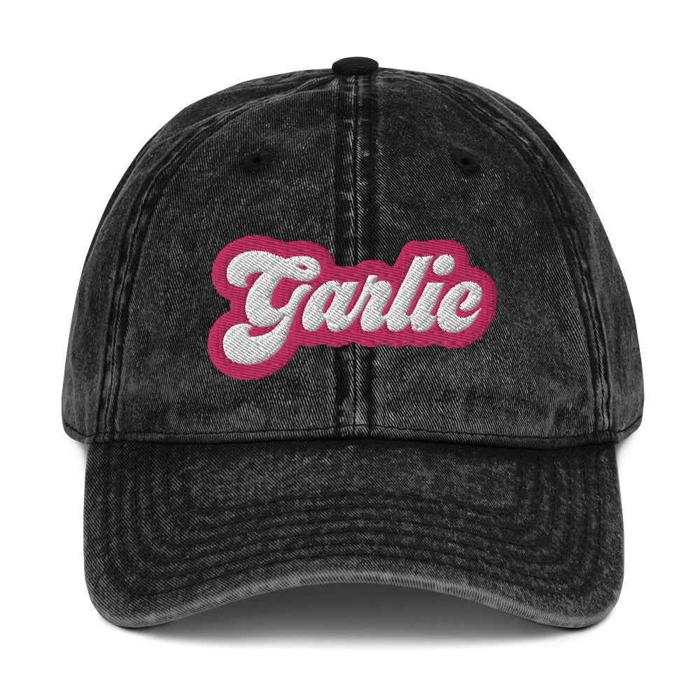 Black garlic dad hat - A colorful dad hat for garlic enthusiasts and foodies of all kinds. It's a vintage style dad hat with the word "garlic" embroidered in pink and white. A funny statement hat for garlic lovers to stand out and show off or a unique gift for your favorite garlic addict. This quirky dad hat is adjustable, weird and made just for you.