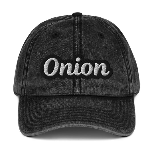 Black onion hat from Nina's Funky Shop by ninanush - This onion dad hat is comfortable, adjustable and the perfect weird hat for everyday fashion. It has a faded vintage-style material, expertly embroidered with the word "onion". Wear this onion hat and make a statement or give it as a gift to an onion enthusiast. Celebrate your favorite foods in our funny food hats, tees and accessories.