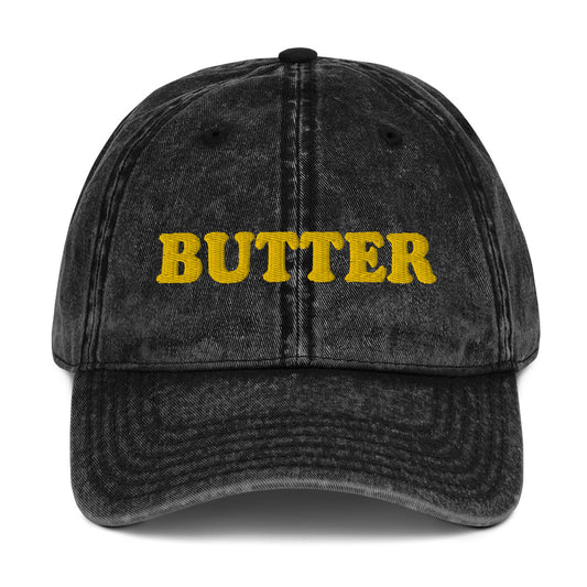 Black Butter Dad Hat - Do you love butter? This butter hat is just what you need. It's comfortable, has an adjustable closure, and comes in a variety of colors with "butter", expertly embroidered on the front. Add a little personality to your everyday style with this funny foodie hat. Perfect for butter lovers and beyond. Celebrate your favorite foods in our funky foodie clothing and accessories. 