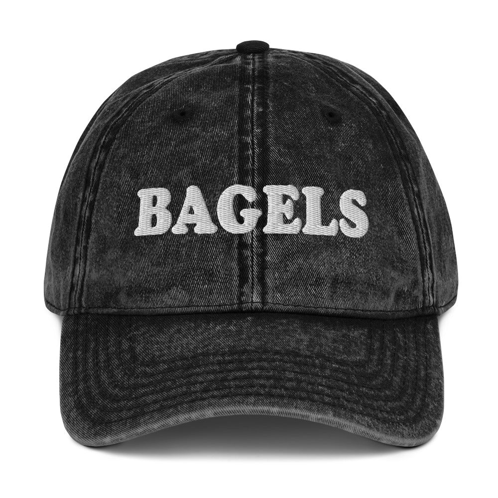 Black Bagels Hat - Our vintage style Bagels Hat is comfortable, adjustable and made just for you. It comes in a variety of colors with a Bagels, expertly embroidered on the front. The perfect hat for bagel enthusiasts and everyday foodies of all kinds.