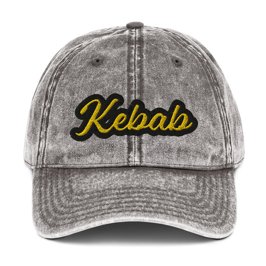 Gray kebab dad hat - This kebab dad hat, made of cotton, is designed for kebab enthusiasts. The hat showcases a washed-out cotton material with vintage-style embroidery. It's the ideal funny food hat for both kebab lovers and Middle Eastern foodies. This kebab hat is a unique, statement accessory for foodies or gift for kebab aficionados. 