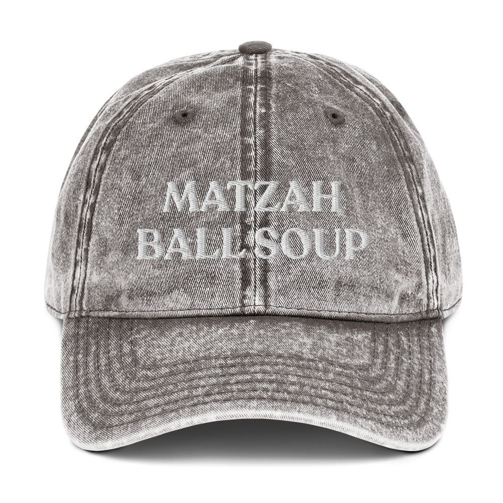 Gray Matzo Ball Soup Hat - Love matzah ball soup? Looking for a funny gift for the holidays? This Matzah Ball Soup Hat is comfortable, has an adjustable closure, and comes in a variety of colors with the funny food design, expertly embroidered on the front. The perfect hat for matzah ball lovers and foodies of all kinds. Celebrate your favorite foods in our funky foodie clothing and accessories.