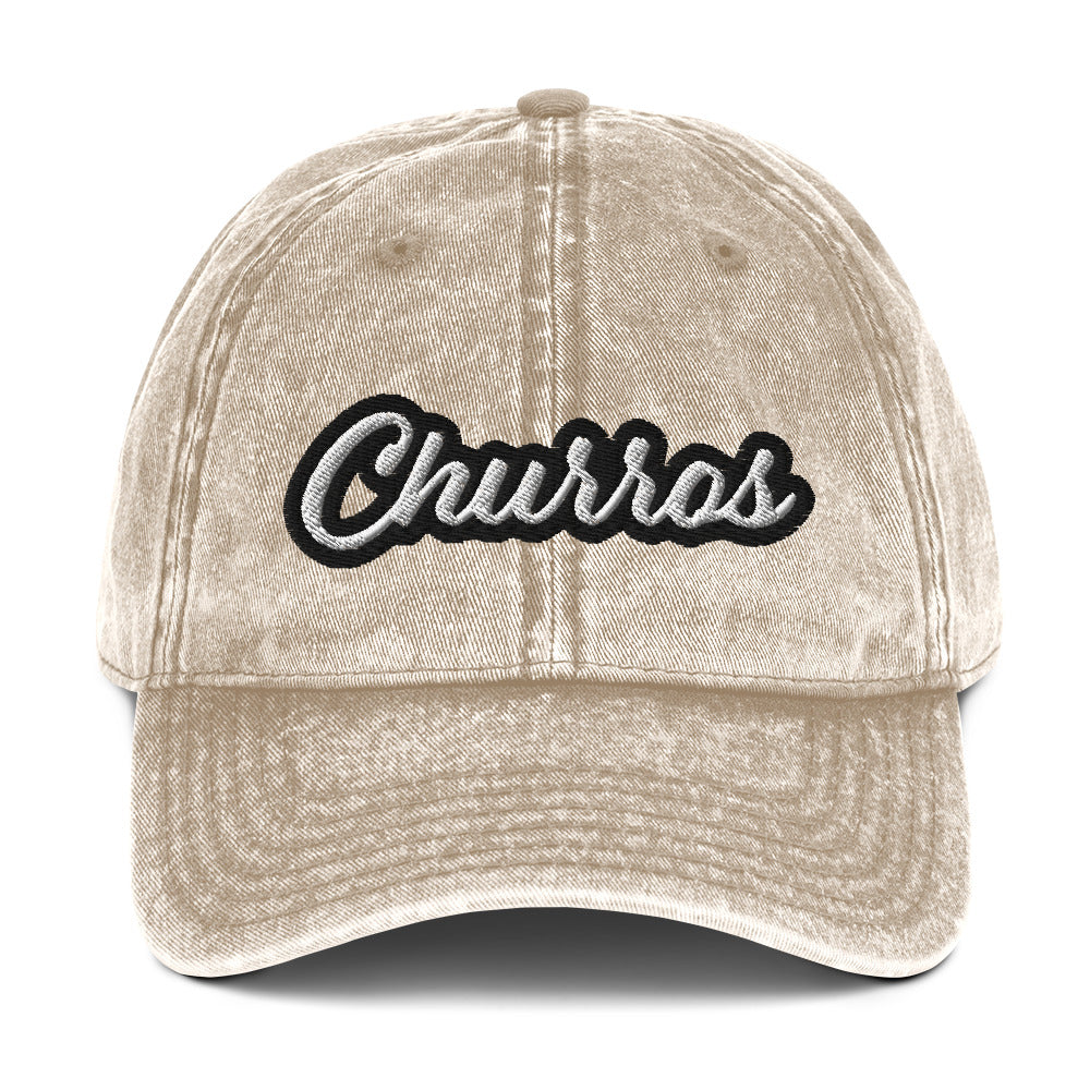 Faded beige churros hat - This embroidered foodie dad hat is designed for churro lovers and foodies of all kinds. It's a comfortable, funny dad hat with a washed out, vintage style. This churro hat is perfect for everyday street style or a funny gift for a churro enthusiast. Stand out and celebrate your favorite foods in our funny foodie clothing and accessories.