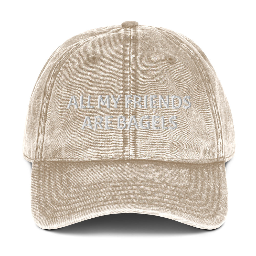 Beige bagel lover hat - The perfect hat for bagel lovers like you. The "ALL MY FRIENDS ARE BAGELS" embroidered dad hat. This funny food hat comes in trendy faded cotton. It's a classic dad hat with a stand out design for bagel enthusiasts. Show your love for bagels with this unique bagel love hat or give it as a funny gift for food lovers.