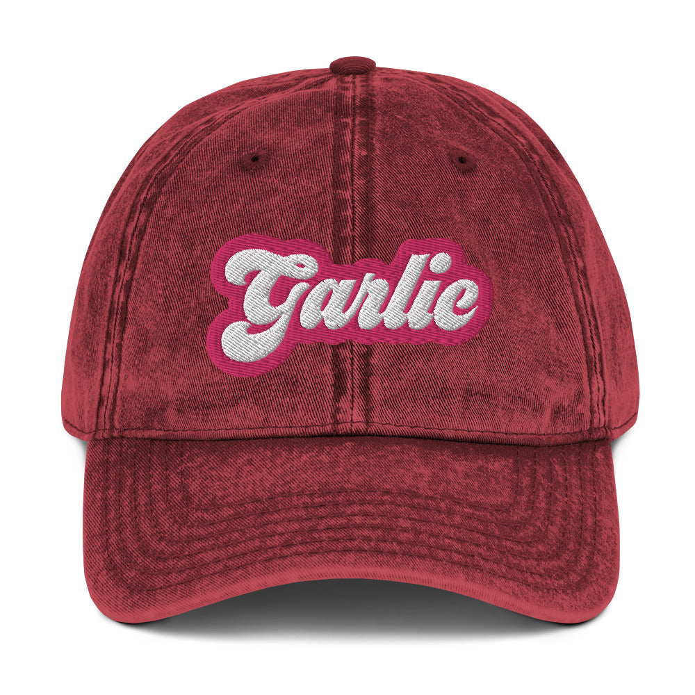 Maroon garlic dad hat -A colorful dad hat for garlic enthusiasts and foodies of all kinds. It's a vintage style dad hat with the word "garlic" embroidered in pink and white. A funny statement hat for garlic lovers to stand out and show off or a unique gift for your favorite garlic addict. This quirky dad hat is adjustable, weird and made just for you.