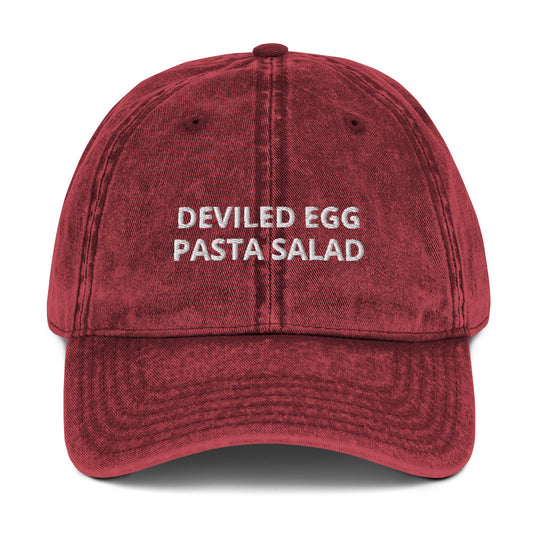 Maroon deviled egg pasta salad dad hat from Nina's Funky Shop by ninanush - Stand out in our Deviled Egg Pasta Salad embroidered dad hat. Add a little personality to your style with this weird dad hat or give it as a funny gift for a deviled egg enthusiast or pasta salad lover. It's a funny food hat that's weird and unique. Celebrate your favorite foods in our funky foodie apparel, designed by Nina.