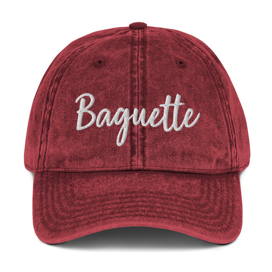 Maroon baguette hat from Nina's Funky Shop by ninanush - Everyone loves a Baguette. Show your love for the classic French bread in this funny foodie dad hat. It's has a stylish washed out material and "Baguette", embroidered on the front. It's a unique accessory that gives personality to your everyday outfit. Stay funky and eat baguettes in this baguette enthusiast hat. 