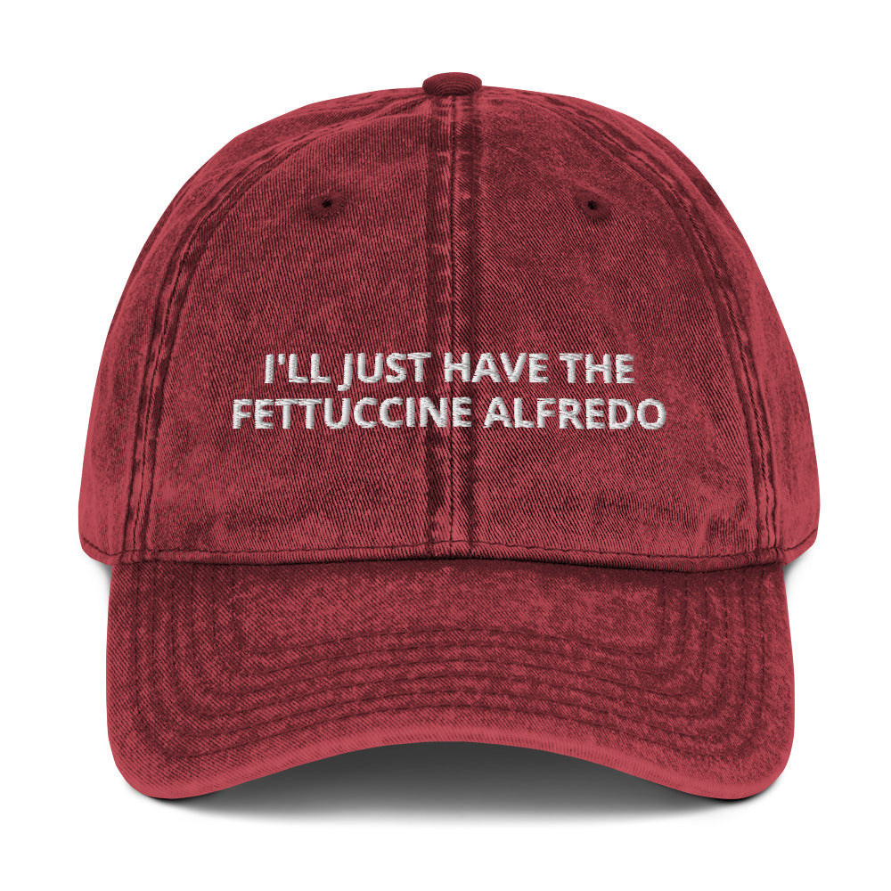 Maroon I'll Just Have The Fettuccine Alfredo Hat - Love Fettuccine Alfredo? Looking for a funny gift for a pasta lover? Our Fettuccine Alfredo Hat is just what you need. It's comfortable, has an adjustable closure, and comes in a variety of colors with "I'll Just Have The Fettuccine Alfredo", expertly embroidered on the front. Eat your favorite fettuccine in style.