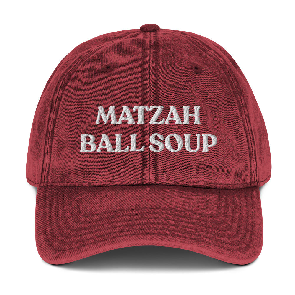 Maroon Matzo Ball Soup Hat - Love matzah ball soup? Looking for a funny gift for the holidays? This Matzah Ball Soup Hat is comfortable, has an adjustable closure, and comes in a variety of colors with the funny food design, expertly embroidered on the front. The perfect hat for matzah ball lovers and foodies of all kinds. Celebrate your favorite foods in our funky foodie clothing and accessories.