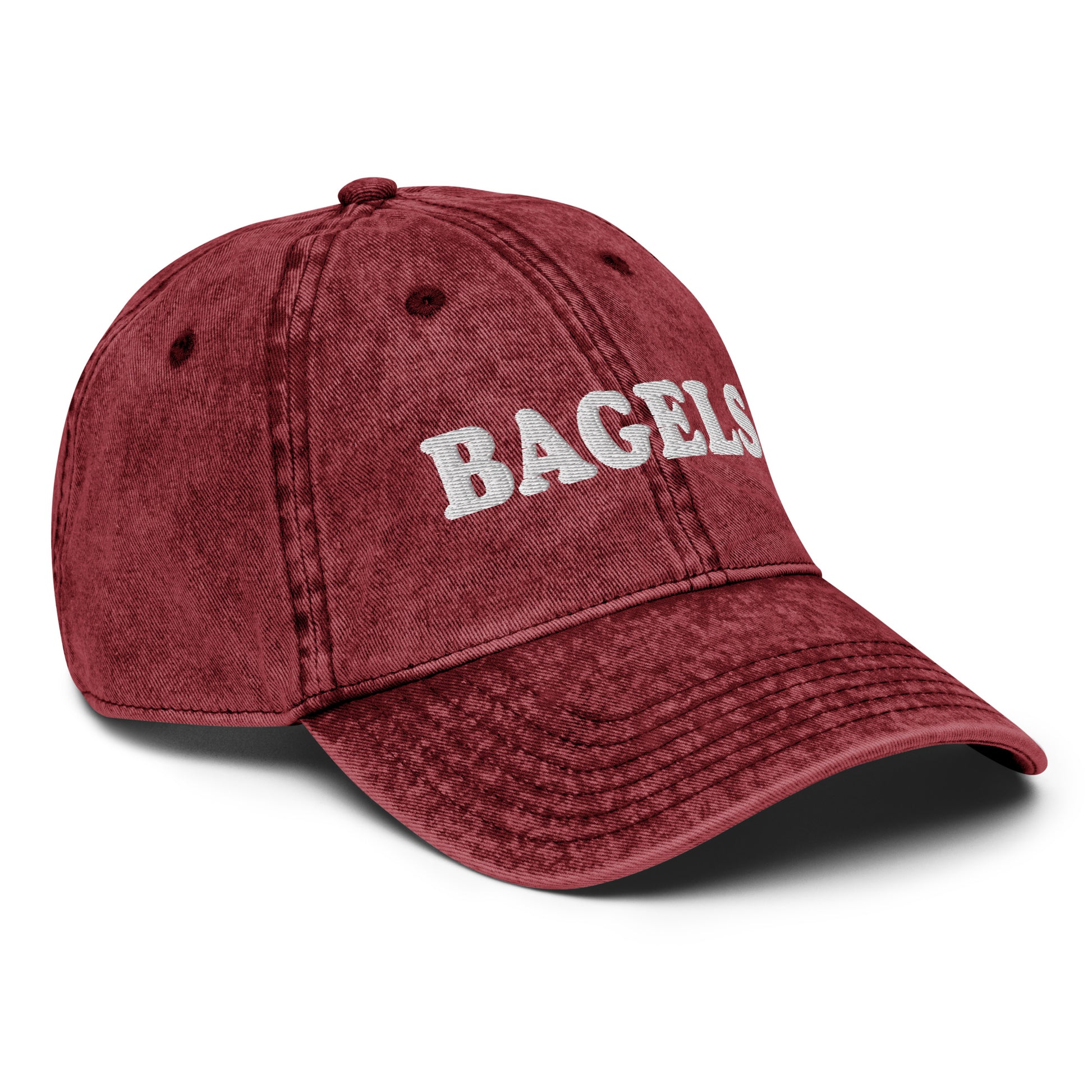 Maroon Bagels Hat - Our vintage style Bagels Hat is comfortable, adjustable and made just for you. It comes in a variety of colors with a Bagels, expertly embroidered on the front. The perfect hat for bagel enthusiasts and everyday foodies of all kinds.