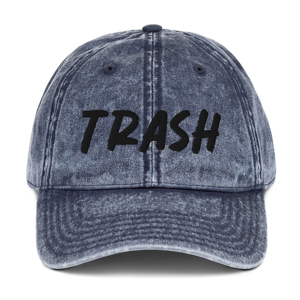 Blue Trash Hat - Live fast, eat trash in this embroidered trash dad hat. It's a classic cotton dad hat with an adjustable closure and "trash", expertly embroidered on the front. Make a statement and live your best life in this funny dad hat. Our trash dad hat with perfect for everyday streetwear or a funny gift for a friend.