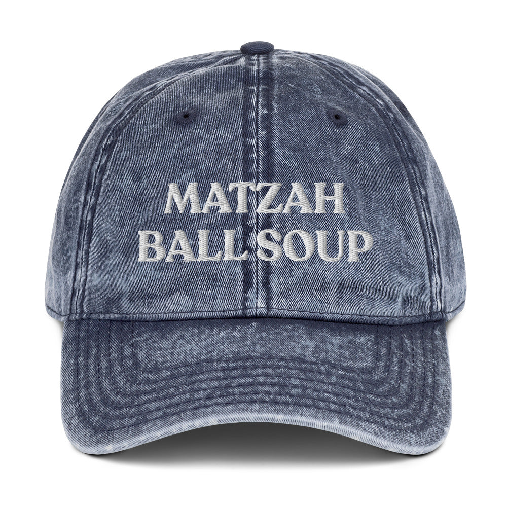 Navy Matzo Ball Soup Hat - Love matzah ball soup? Looking for a funny gift for the holidays? This Matzah Ball Soup Hat is comfortable, has an adjustable closure, and comes in a variety of colors with the funny food design, expertly embroidered on the front. The perfect hat for matzah ball lovers and foodies of all kinds. Celebrate your favorite foods in our funky foodie clothing and accessories.