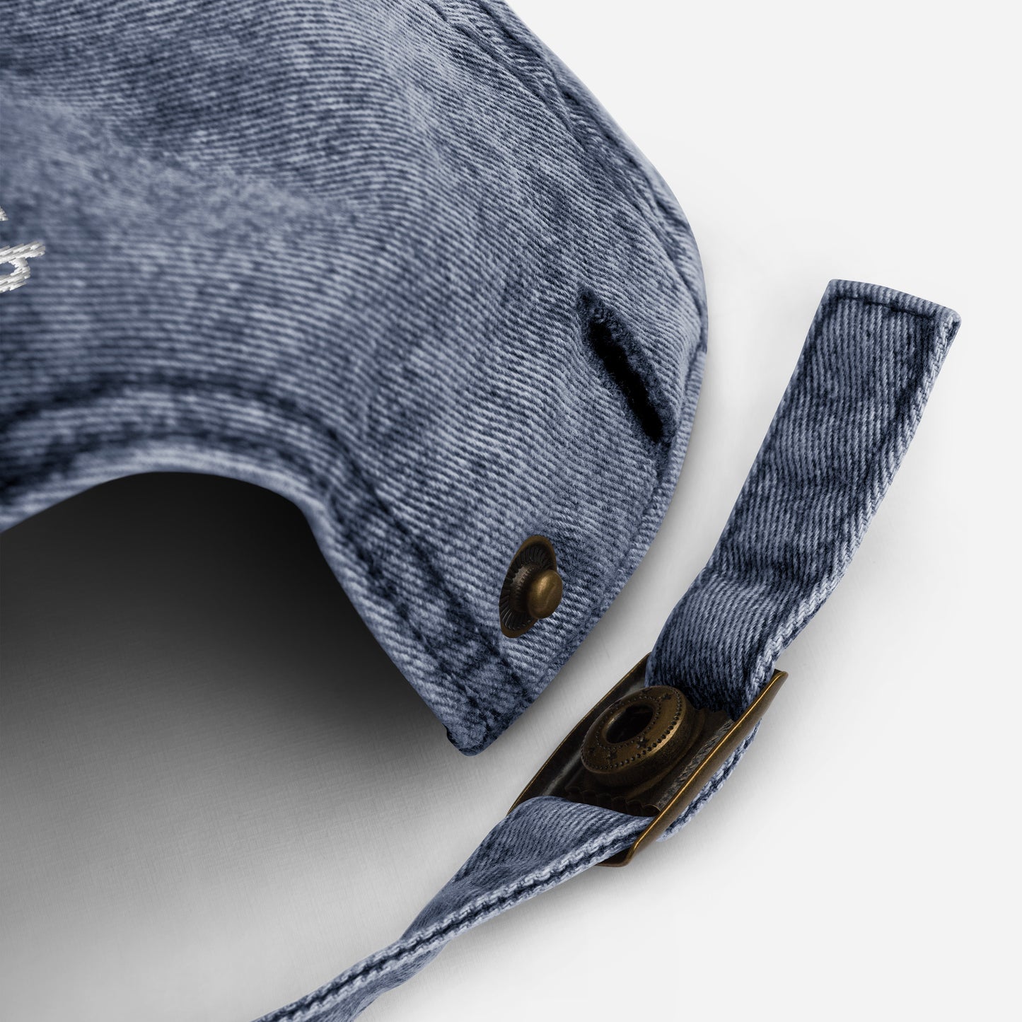 Adjustable closure of navy eggplant parm dad hat - An eggplant parmesan hat for foodies and Italian food enthusiasts. Celebrate eggplant parm in this funny embroidered dad hat. It's a unique foodie hat that's made just for you. Share your love for eggplant parmesan in this random statement dad hat or give it as a funny gift for foodie or eggplant lovers of all kinds.