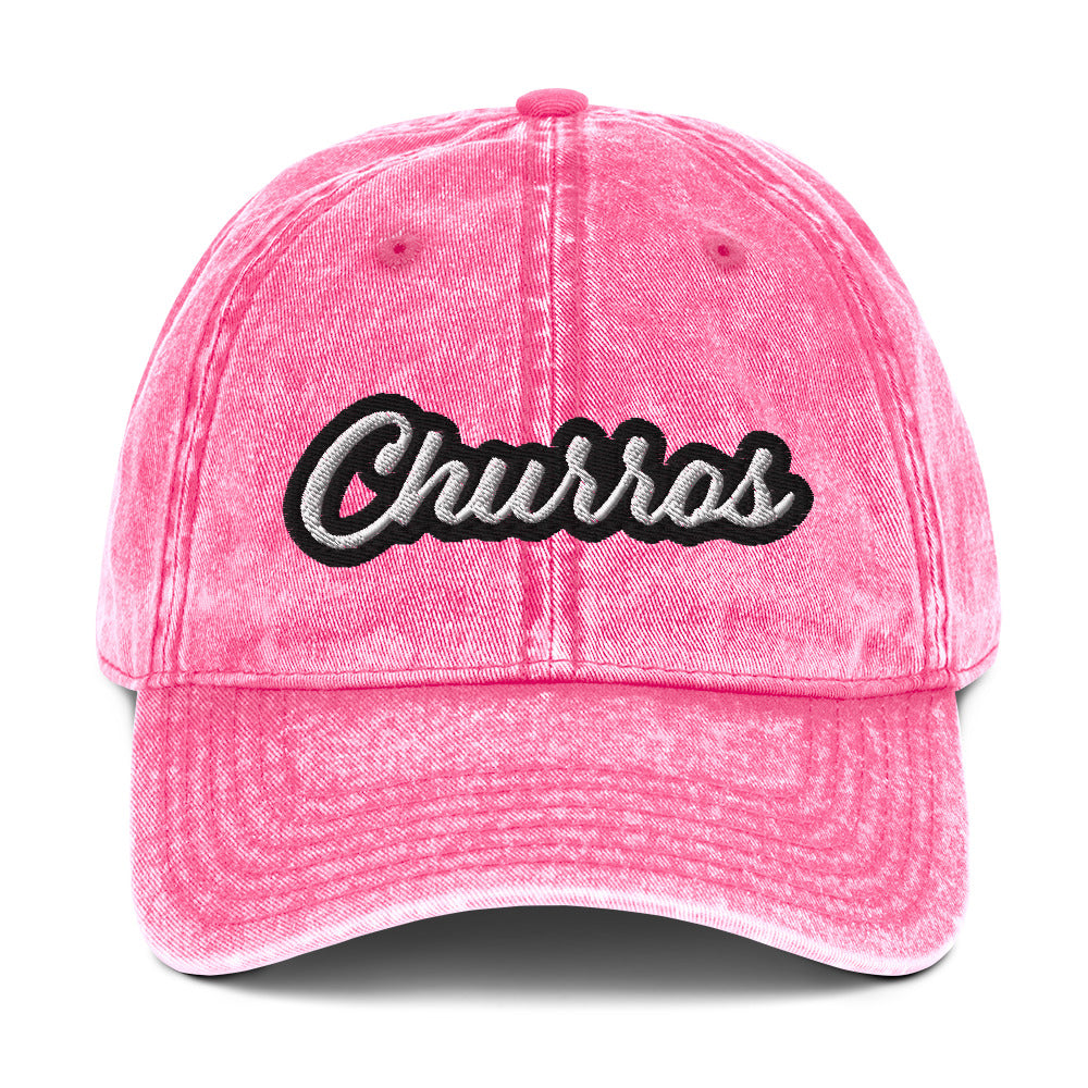 Fade pink churros hat - This embroidered foodie dad hat is designed for churro lovers and foodies of all kinds. It's a comfortable, funny dad hat with a washed out, vintage style. This churro hat is perfect for everyday street style or a funny gift for a churro enthusiast. Stand out and celebrate your favorite foods in our funny foodie clothing and accessories.