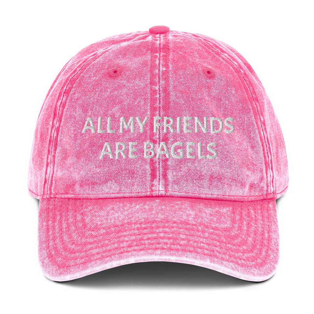 Pink bagel lover hat - The perfect hat for bagel lovers like you. The "ALL MY FRIENDS ARE BAGELS" embroidered dad hat. This funny food hat comes in trendy faded cotton. It's a classic dad hat with a stand out design for bagel enthusiasts. Show your love for bagels with this unique bagel love hat or give it as a funny gift for food lovers.