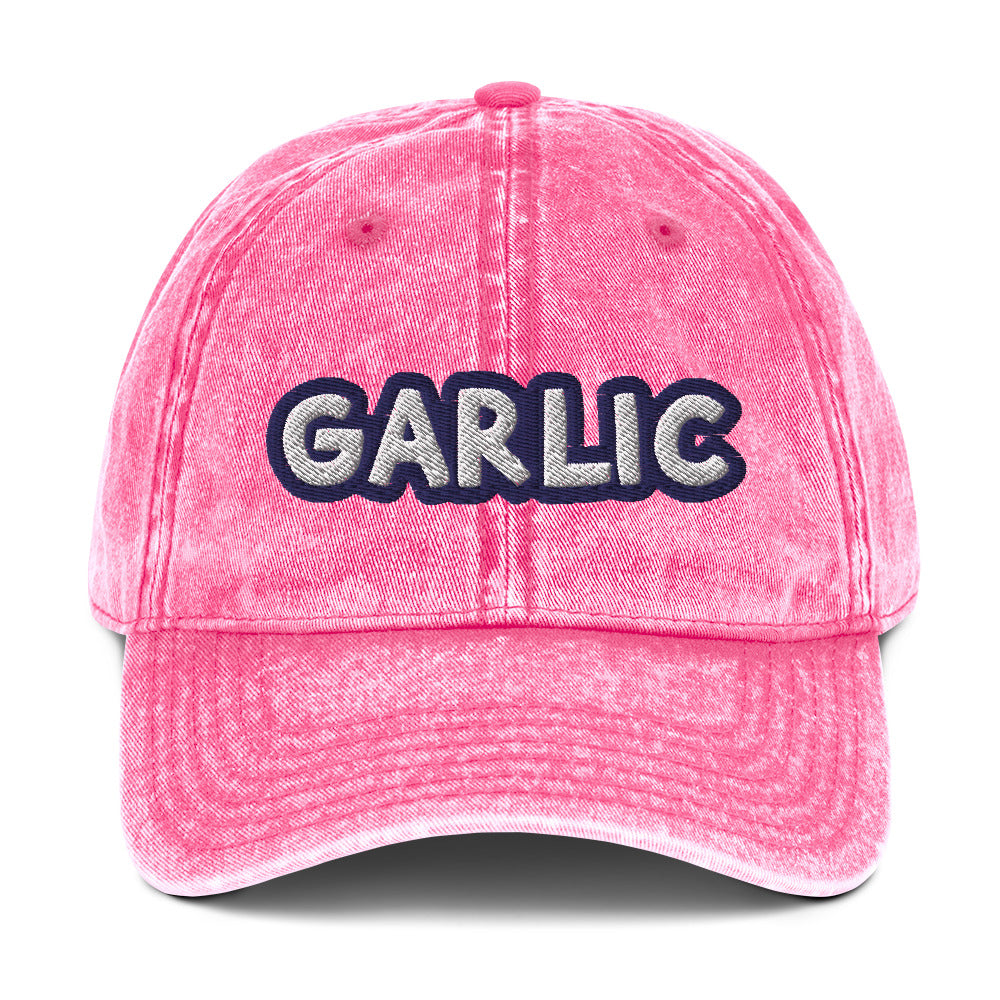 Pink garlic dad hat from Nina's Funky Shop by ninanush - If you're a garlic lover, this funny food hat was designed just for you. Eat garlic in style and make a statement in this stand out foodie dad hat. It's a garlic lover hat that's made of cotton, with a washed out vintage style and an eye-catching blue and white embroidery. Perfect for garlic enthusiasts and foodies of all kinds.