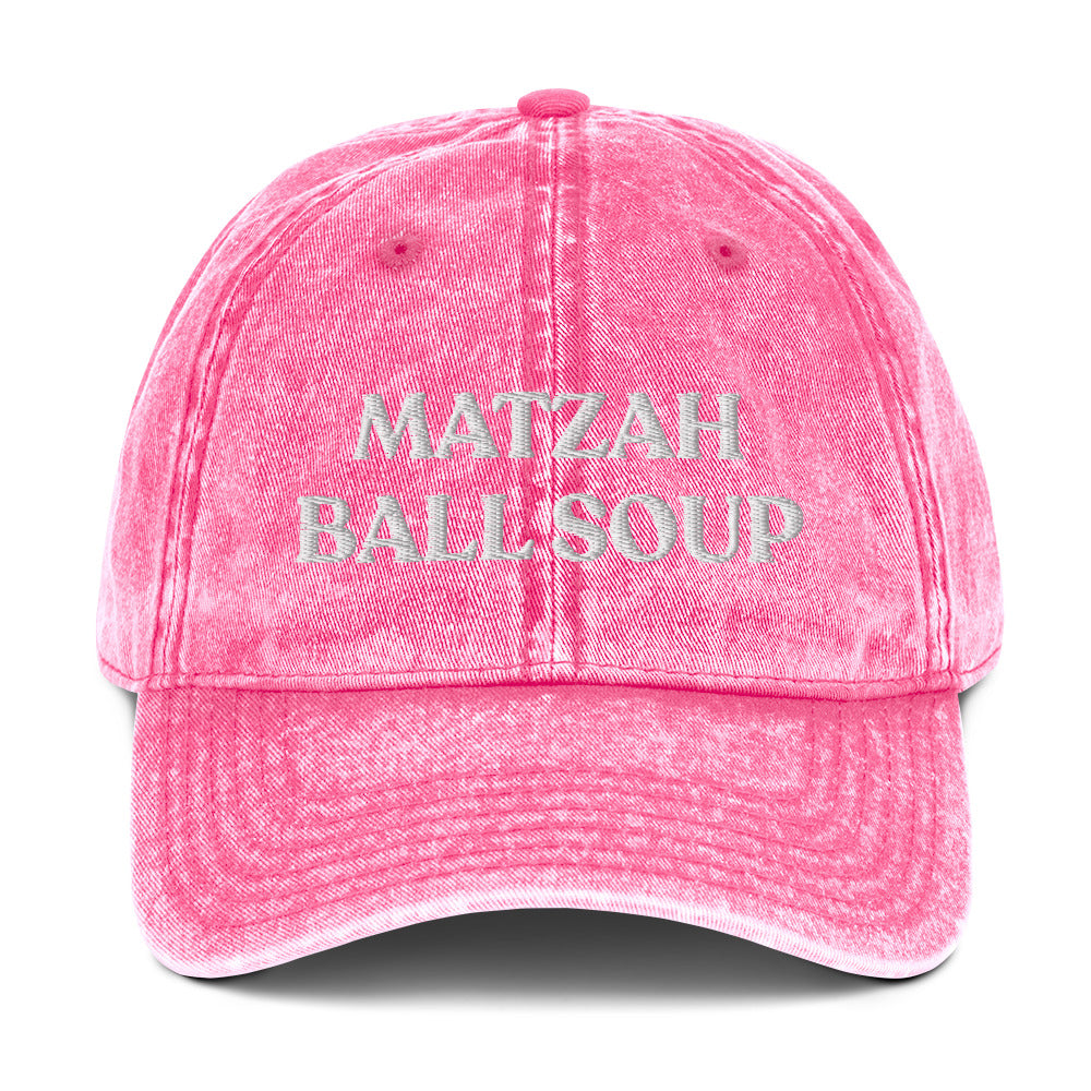 Pink Matzo Ball Soup Hat - Love matzah ball soup? Looking for a funny gift for the holidays? This Matzah Ball Soup Hat is comfortable, has an adjustable closure, and comes in a variety of colors with the funny food design, expertly embroidered on the front. The perfect hat for matzah ball lovers and foodies of all kinds. Celebrate your favorite foods in our funky foodie clothing and accessories.