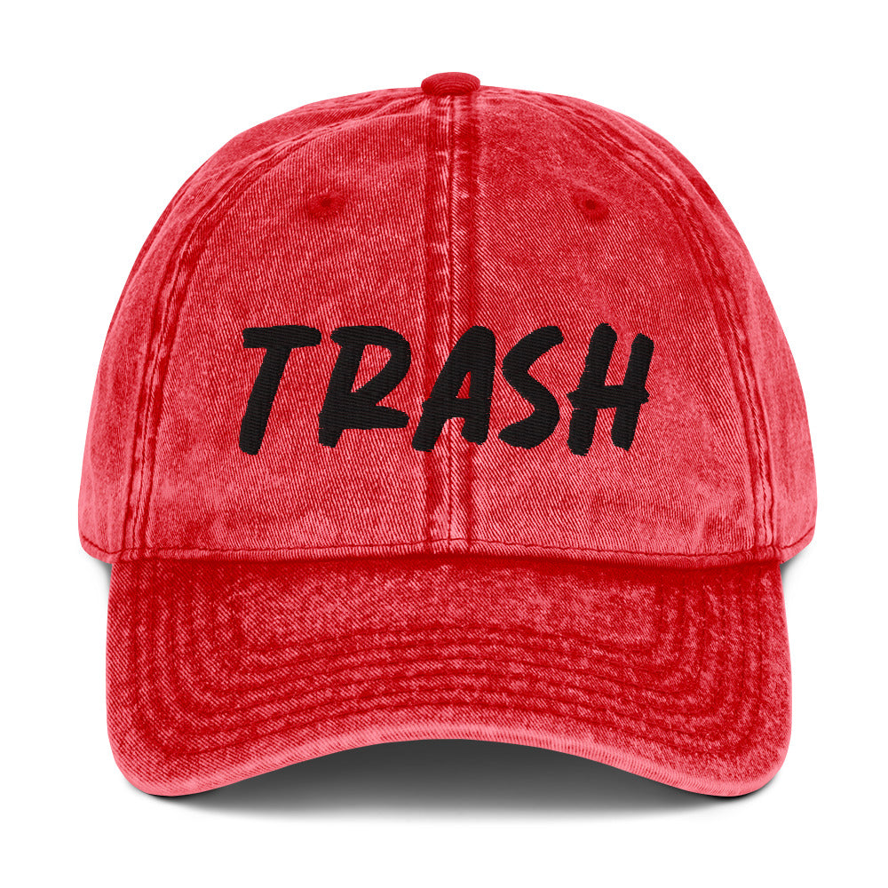 Red Trash Hat - Live fast, eat trash in this embroidered trash dad hat. It's a classic cotton dad hat with an adjustable closure and "trash", expertly embroidered on the front. Make a statement and live your best life in this funny dad hat. Our trash dad hat with perfect for everyday streetwear or a funny gift for a friend.