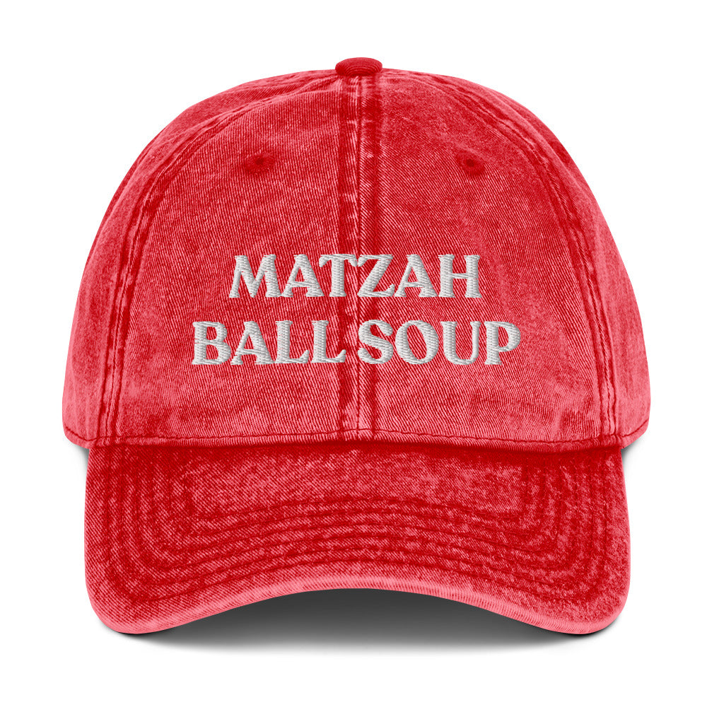 Red Matzo Ball Soup Hat - Love matzah ball soup? Looking for a funny gift for the holidays? This Matzah Ball Soup Hat is comfortable, has an adjustable closure, and comes in a variety of colors with the funny food design, expertly embroidered on the front. The perfect hat for matzah ball lovers and foodies of all kinds. Celebrate your favorite foods in our funky foodie clothing and accessories.