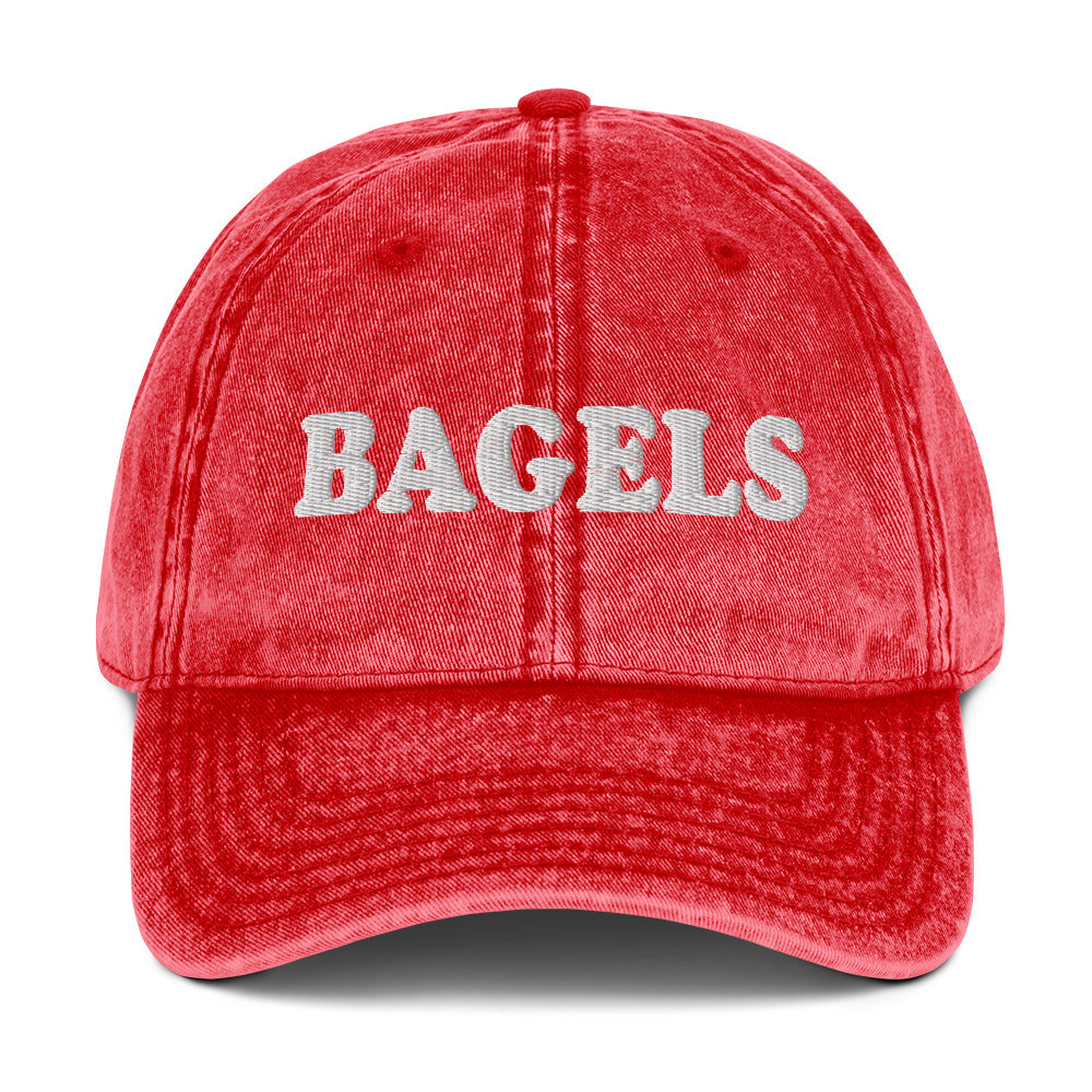 Red Bagels Hat - Our vintage style Bagels Hat is comfortable, adjustable and made just for you. It comes in a variety of colors with a Bagels, expertly embroidered on the front. The perfect hat for bagel enthusiasts and everyday foodies of all kinds.