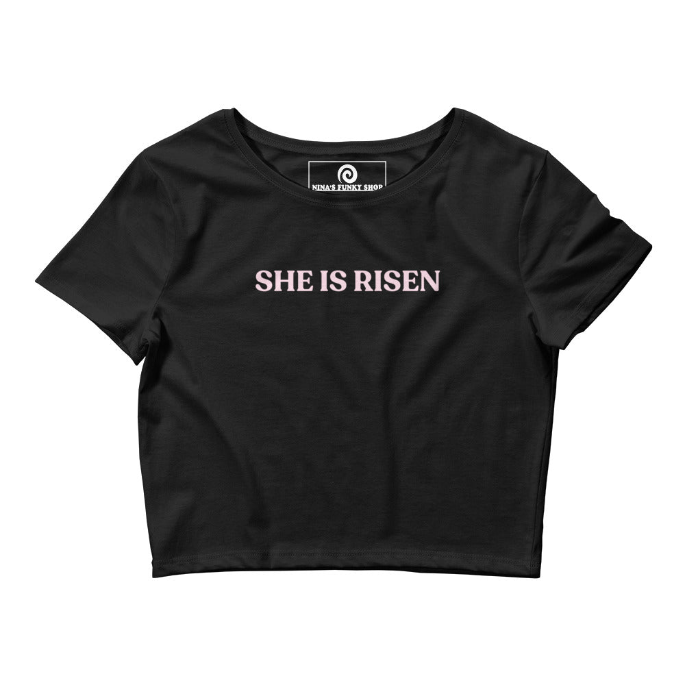 Black She Is Risen T-shirt - She is risen! Our She Is Risen Crop Top is tight-fitting with a simple text design, expertly printed on the front. It's a classic crop tee that's perfect for everyday streetwear. Make a statement in this funny feminist crop top!